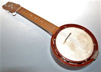 Lot 169 - A Keech Banjulele in leather case