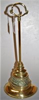 Lot 175 - A Victorian brass and cast iron door stop,...
