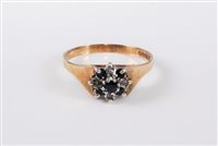 Lot 330 - A 9ct sapphire and diamond cluster ring, the...