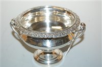 Lot 275 - An Edwardian silver pedesal urn, having leaf...