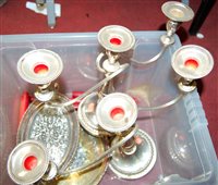 Lot 397 - A pair of silver plated three sconce table...