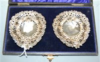 Lot 414 - A pair of circa 1900 silver bonbon dishes, of...