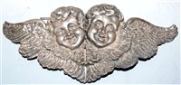 Lot 423 - A circa 1900 silver two-piece buckle, repousse...