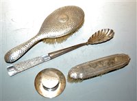 Lot 437 - Two silver backed brushes; and a silver and...