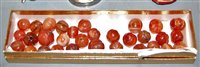 Lot 436 - A collection of hand-carved melon shaped pema...