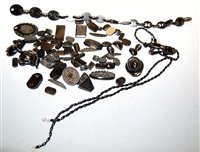 Lot 450 - A collection of assorted Whitby jet to include...