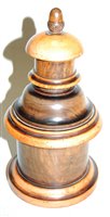 Lot 476 - A late 19th century treen tea caddy, the cover...