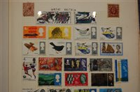 Lot 514 - A mid-20th century stamp album and contents,...