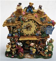 Lot 572 - The Boyds Bears Garden Shop clock by the...