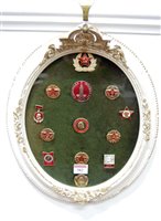 Lot 582 - A collection of Russian enamelled badges, to...