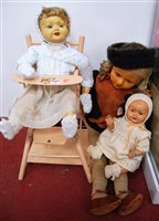 Lot 583 - Three mid-20th century dolls, together with a...
