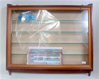 Lot 834 - A small display cabinet suitable for 00 gauge...