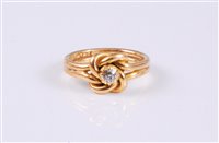 Lot 2650 - An 18ct diamond knot ring, the old cut diamond,...