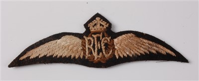 Lot 130 - A post WW I RFC cloth wing badge.
