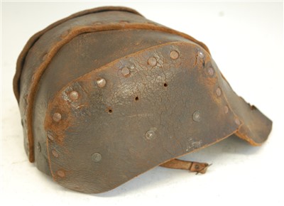 Lot 111 - A British 1916 pattern brown leather Tank Corps helmet