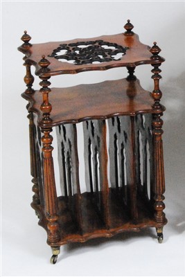 Lot 1249 - A late Victorian walnut canterbury whatnot, of...