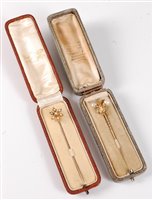 Lot 2502 - Two cased pearl stick pins, the first with two...