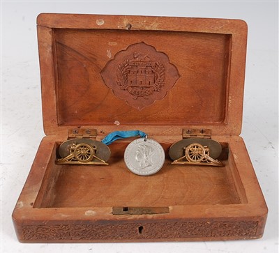 Lot 53 - An early 20th century Indian hardwood table cigarette box