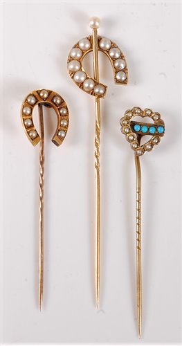 Lot 2525 - Three stick pins: a 15ct split pearl stick pin,...