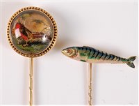 Lot 2527 - Two stick pins of sporting interest: a reverse...