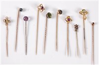 Lot 2536 - Ten gemset stick pins: a moss agate stick pin...