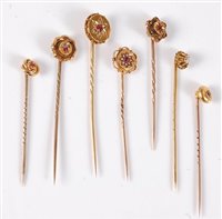 Lot 2539 - Seven ruby, diamond and pearl stick pins: an...