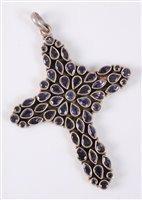 Lot 1321 - A silver and iolite cross pendant, the mixed...