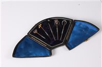 Lot 2565 - A cased group of six stick pins: to include a...
