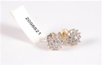 Lot 2630 - A pair of 9ct diamond cluster earstuds, the...