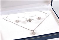 Lot 2667 - An 18ct white gold and diamond suite,...