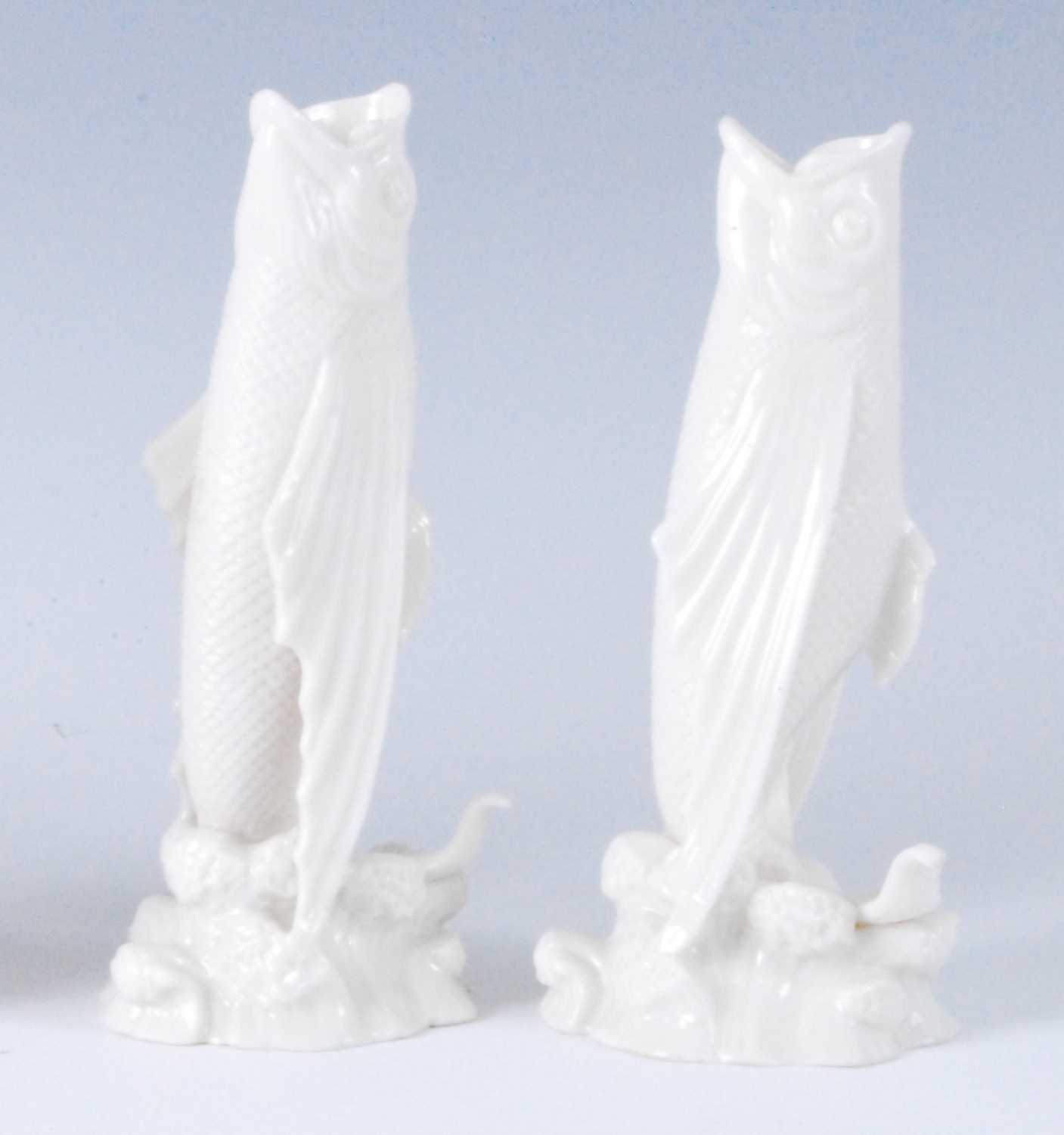 Lot 1101 - A pair of first period Belleek porcelain fish...