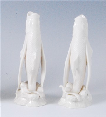Lot 1101 - A pair of first period Belleek porcelain fish...
