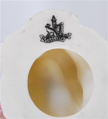 Lot 1101 - A pair of first period Belleek porcelain fish...