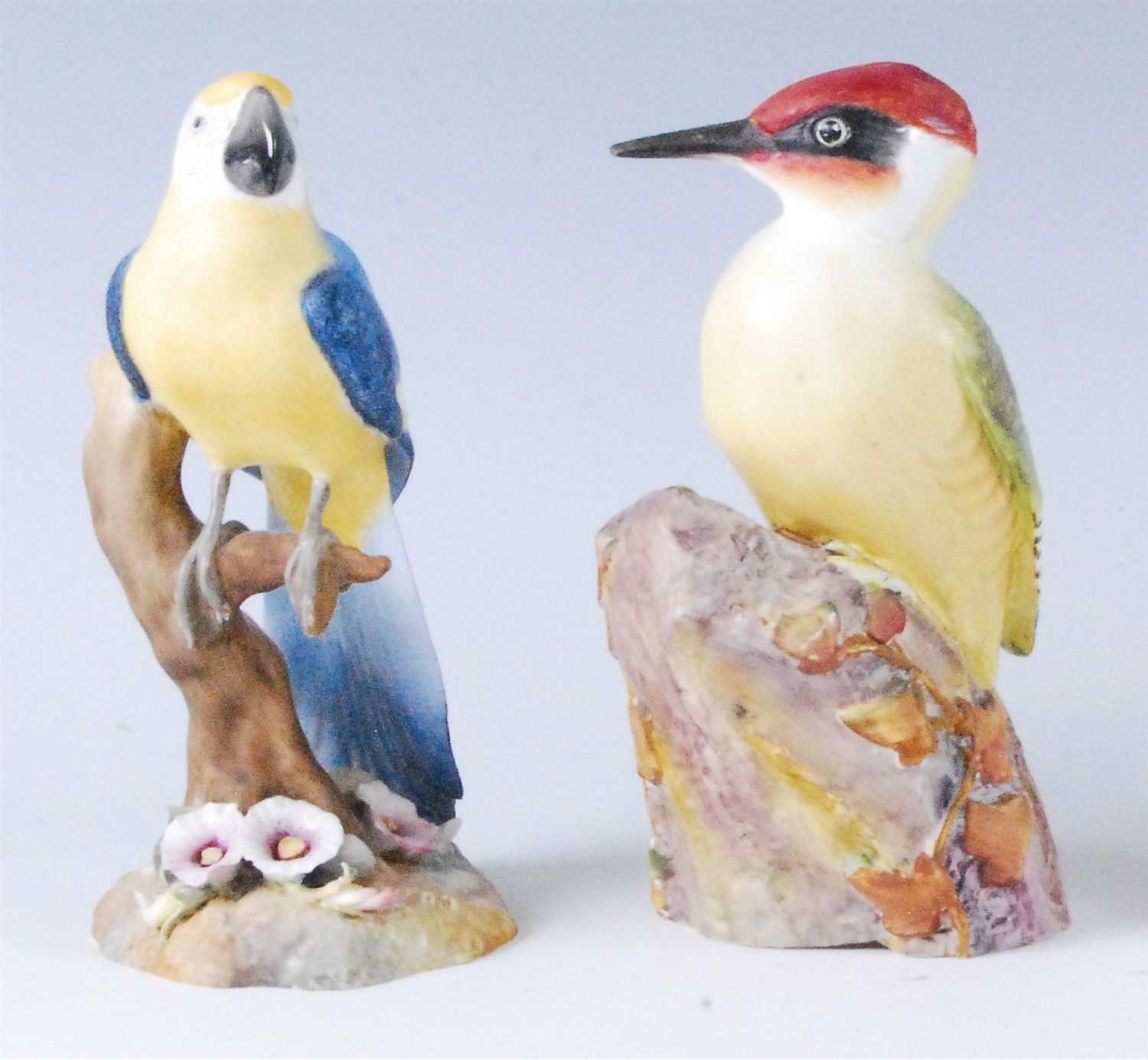 Lot 1100 - A Royal Worcester porcelain woodpecker,...