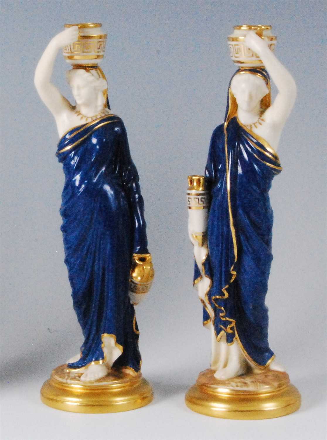 Lot 1097 - A pair of Royal Worcester figurines of...
