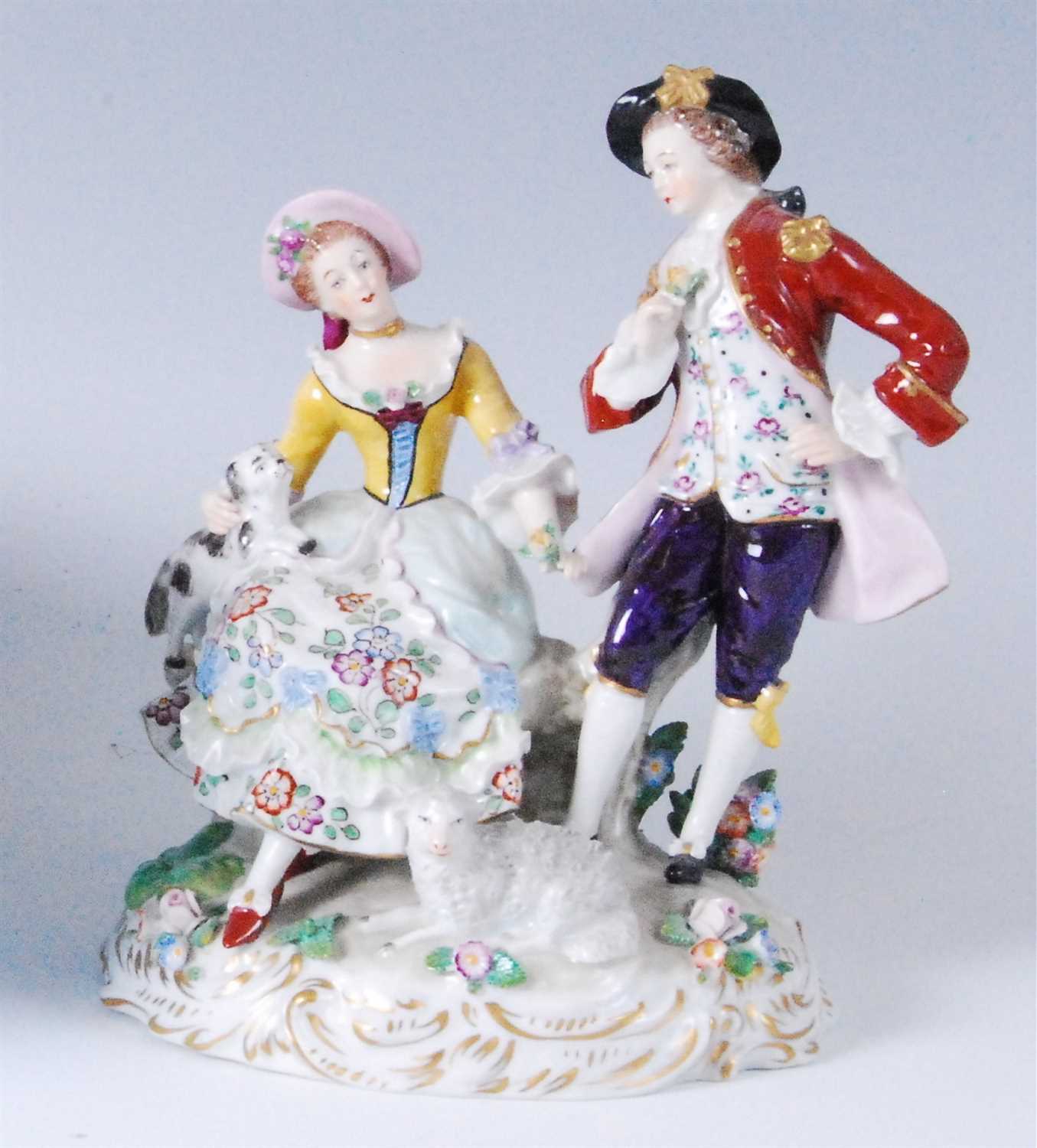 Lot 1060 - A Sitzendorf porcelain figure group as a...