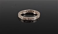 Lot 2599 - A diamond eternity ring, the round brilliant...