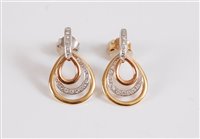 Lot 2628 - A pair of 18ct tri-colour gold and diamond...