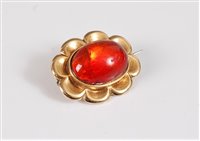 Lot 1303 - A fire opal brooch, the oval fire opal...