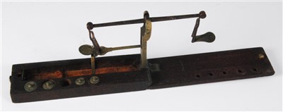 Lot 2066 - A set of George III folding brass sovereign scales