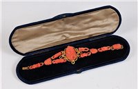 Lot 1267 - A 19th century carved coral cameo bracelet,...