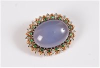 Lot 1262 - A chalcedony, diamond and emerald brooch, the...