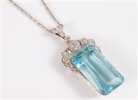 Lot 1217 - An Art Deco aquamarine and diamond pendant,...