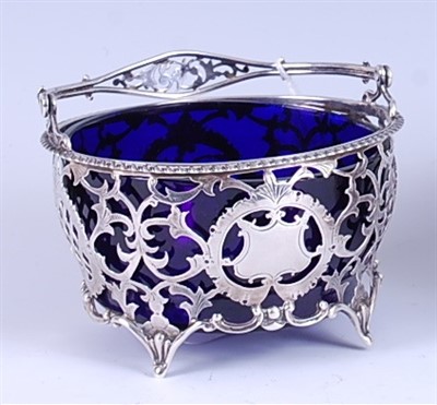 Lot 1211 - An Edwardian silver sweetmeat basket, having...
