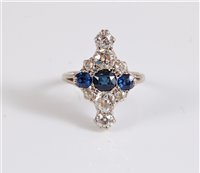Lot 1240 - An early 20th century 18ct sapphire and...