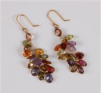 Lot 2632 - A pair of multi gemset earrings, set with...