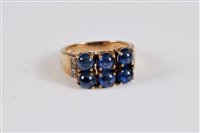 Lot 2591 - A 9ct sapphire and diamond ring, the six round...