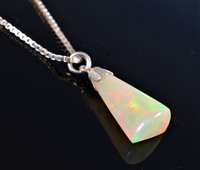 Lot 2584 - An opal pendant, the pear shaped opal, 20mm...