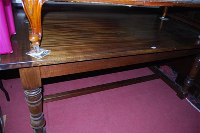 Lot 1296 - A walnut refectory table, having cleated ends...