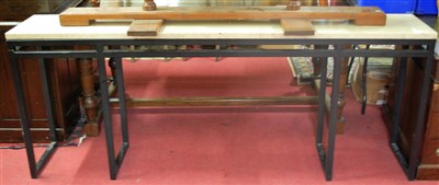 Lot 1292 - A contemporary polished travertine topped and...